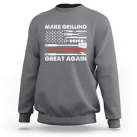 Charcoal gray crewneck sweatshirt with grilling tool graphic and “Make Grilling Great Again” text