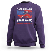 Purple crewneck sweatshirt with grilling-themed graphic and slogan print on front