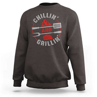 Dark chocolate crewneck sweatshirt with long sleeves and back BBQ grill graphic print
