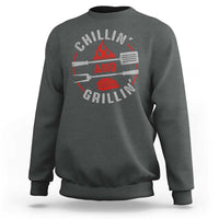 Dark heather crewneck sweatshirt with long sleeves and back BBQ grill graphic print