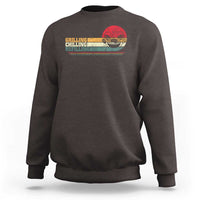 Dark chocolate sweatshirt with front grill-themed text and smoker graphic.
