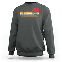 Dark heather sweatshirt with front grill-themed text and smoker graphic.