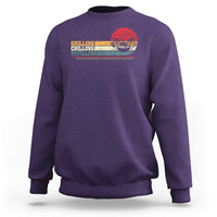 Purple sweatshirt with front grill-themed text and smoker graphic.