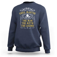 Navy crewneck sweatshirt with grill master emblem and “the myth” text graphic on chest