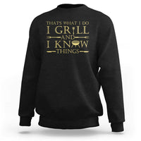 Black grilling pitmaster sweatshirt with gold “I GRILL AND I KNOW THINGS” text