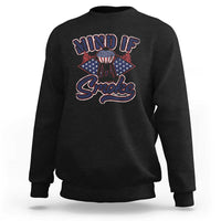 Black sweatshirt with "MIND IF" "Smoke" graphic and grill/badge design