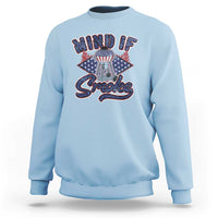 Light blue sweatshirt with "MIND IF" "Smoke" graphic and grill/badge design