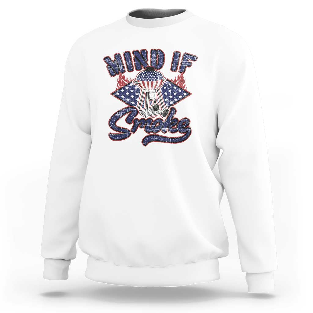 White sweatshirt with "MIND IF" "Smoke" graphic and grill/badge design