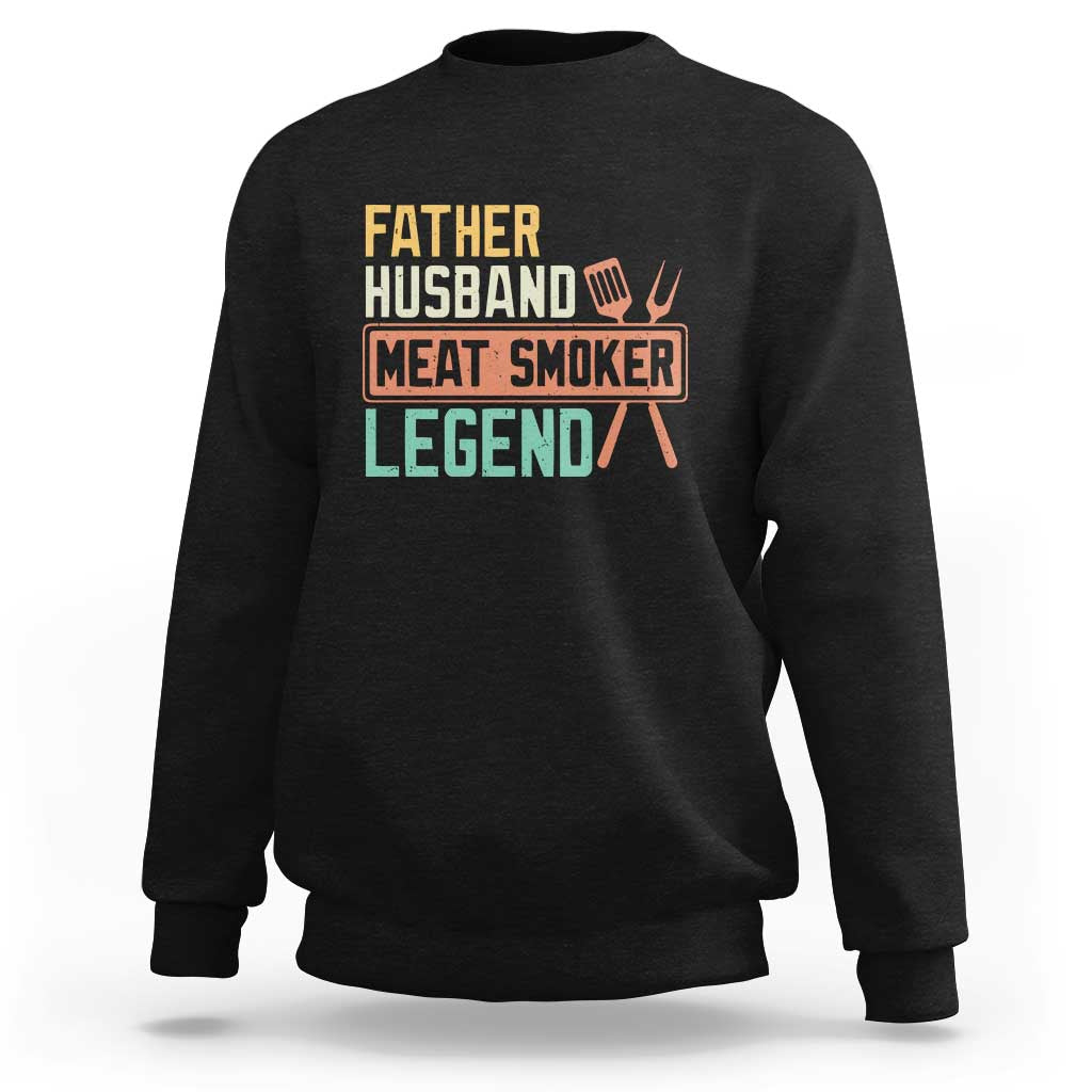 Men's black crewneck sweatshirt with 'Meat Smoker' retro graphic on chest