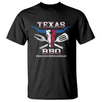 Black graphic T-shirt with Texas BBQ emblem and slogan on chest