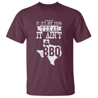 Maroon crew-neck T-shirt with “If it’s not from Texas it ain’t BBQ” graphic
