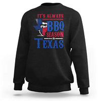 Black crewneck sweatshirt with colorful Texas BBQ Season graphic on back.