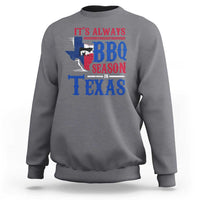 Charcoal crewneck sweatshirt with colorful Texas BBQ Season graphic on back.