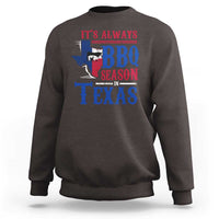 Dark chocolate crewneck sweatshirt with colorful Texas BBQ Season graphic on back.