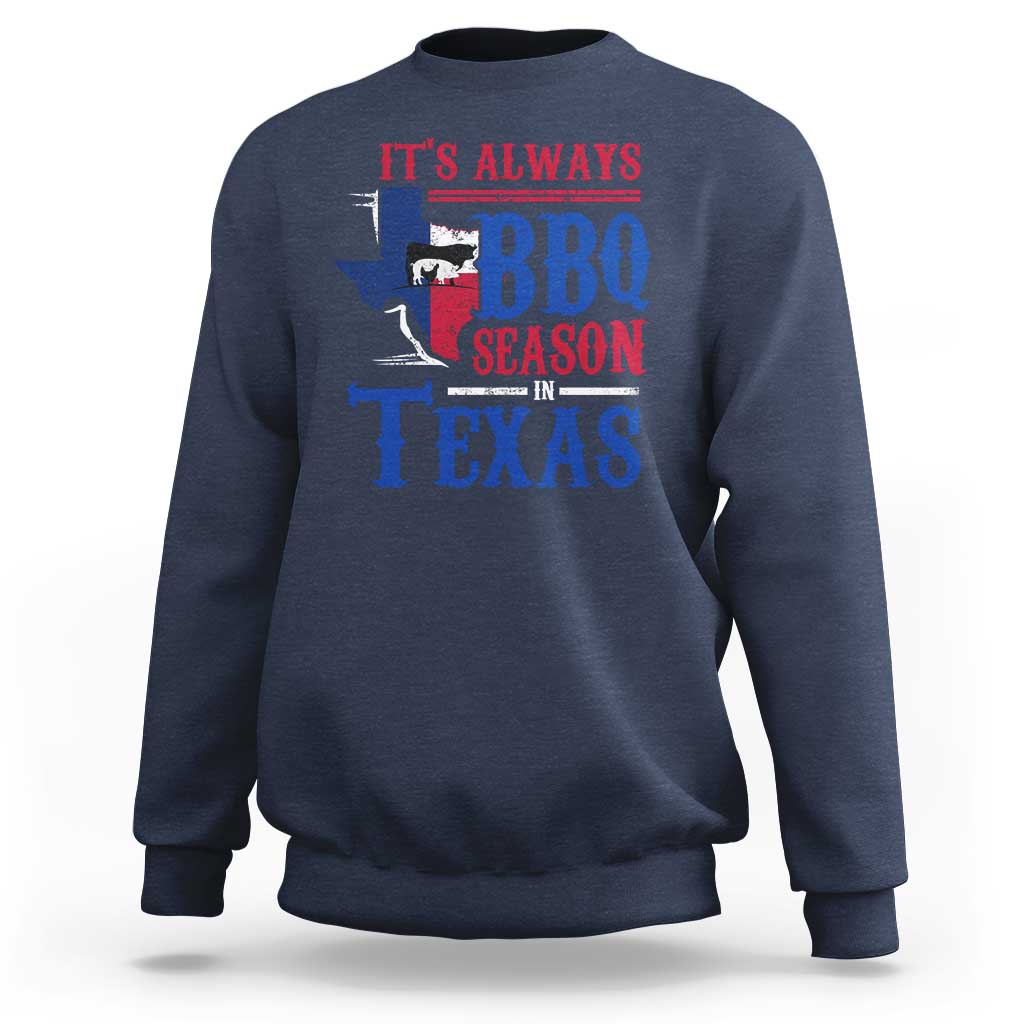 Navy crewneck sweatshirt with colorful Texas BBQ Season graphic on back.
