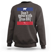 Dark chocolate BBQ sweatshirt with chest graphic reading “Don’t mess with Texas BBQ”