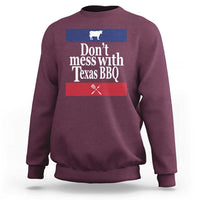 Maroon BBQ sweatshirt with chest graphic reading “Don’t mess with Texas BBQ”