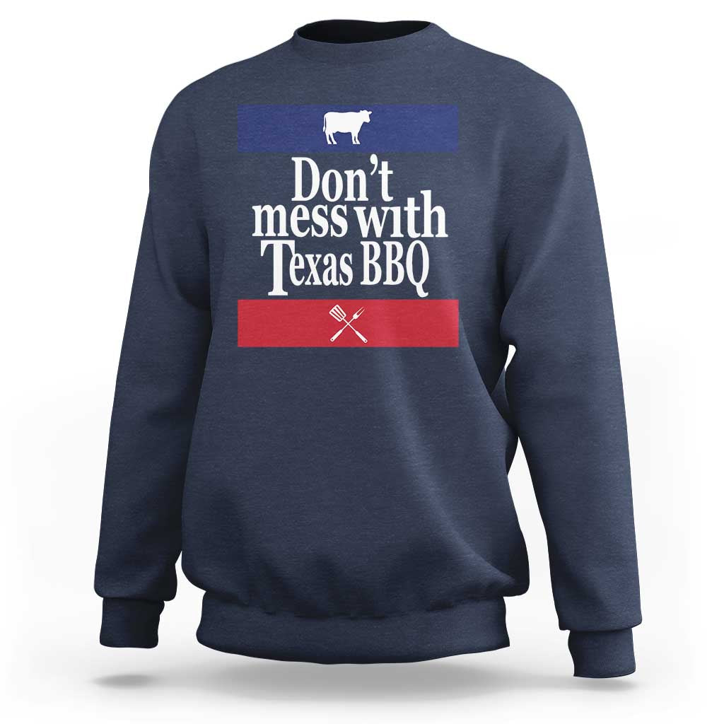 Navy BBQ sweatshirt with chest graphic reading “Don’t mess with Texas BBQ”
