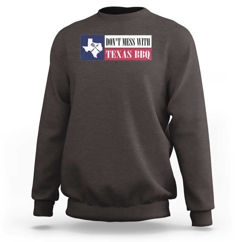 Dark chocolate crewneck sweatshirt with Texas BBQ text and Texas map graphic on the chest.
