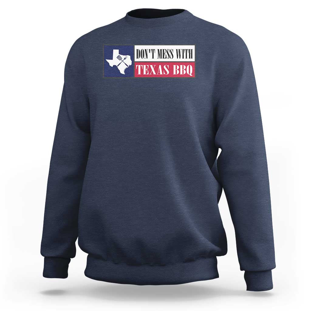 Navy crewneck sweatshirt with Texas BBQ text and Texas map graphic on the chest.