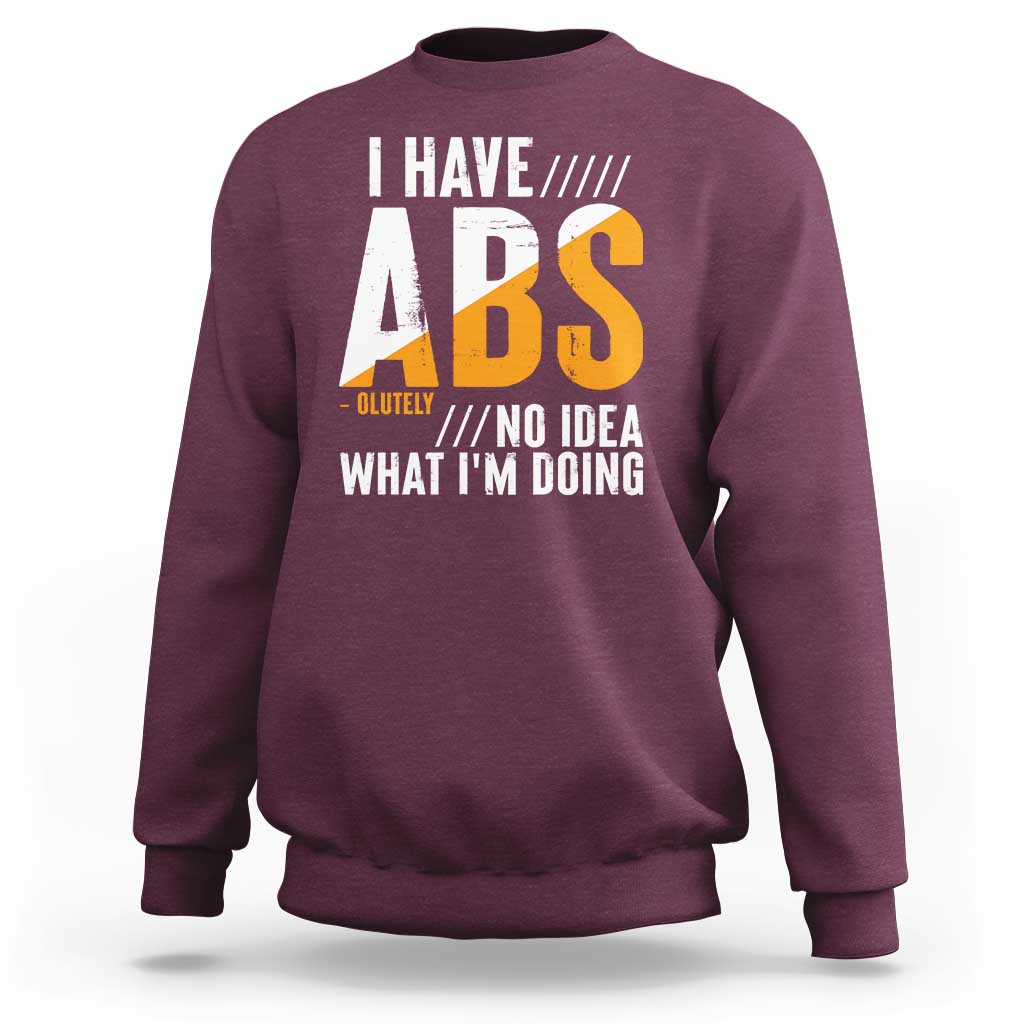Maroon sweatshirt with back 'I HAVE ABS' graphic text