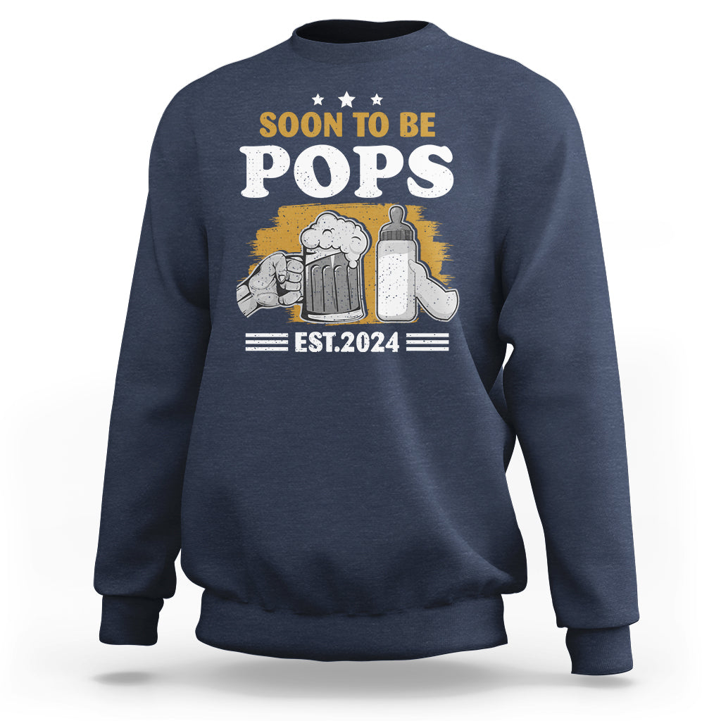 Dad announcement sweatshirt in navy with “SOON TO BE POPS” graphic and “EST.2024” text