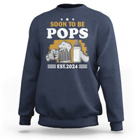 Dad announcement sweatshirt in navy with “SOON TO BE POPS” graphic and “EST.2024” text