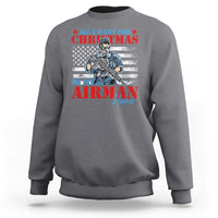 Heather gray crewneck sweatshirt with front Airman holiday graphic and long sleeves
