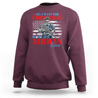 Maroon crewneck sweatshirt with Airman Home graphic and American flag stars