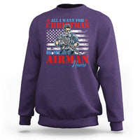 Purple crewneck sweatshirt with graphic text and military airman illustration on front