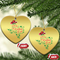 Two gold heart-shaped Christmas ornaments with cowboy hat and "Merry Christmas Y'all".