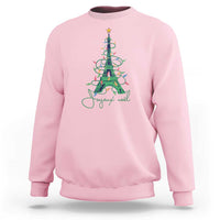 Light pink crewneck sweatshirt with Eiffel Tower Christmas tree graphic in multicolor