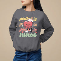Charcoal pediatric nurse sweatshirt with cartoon nurse and stethoscope graphic