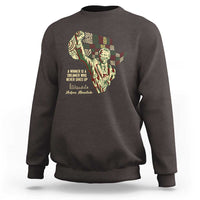 Dark chocolate crewneck sweatshirt with Nelson Mandela portrait graphic on chest