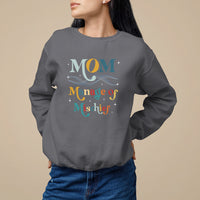 Charcoal women's sweatshirt with 'MOM Manage of Mischief' graphic on front