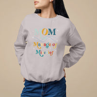 Ice gray women's sweatshirt with 'MOM Manage of Mischief' graphic on front