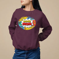 Maroon super mom comic sweatshirt with oval chest graphic print