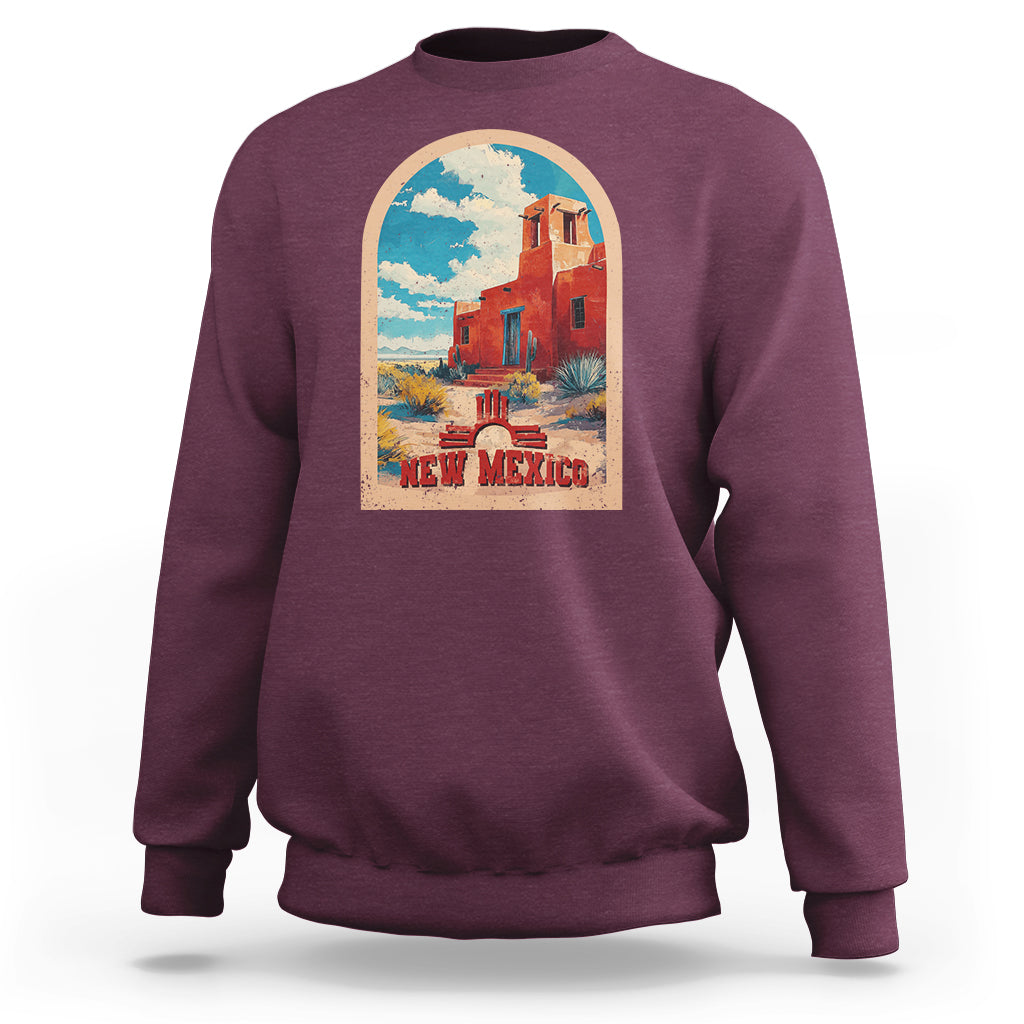 Maroon crewneck sweatshirt with New Mexico graphic print on chest