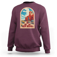 Maroon crewneck sweatshirt with New Mexico graphic print on chest