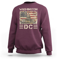 Maroon crewneck sweatshirt with Washington Capitol and EDC graphic on front