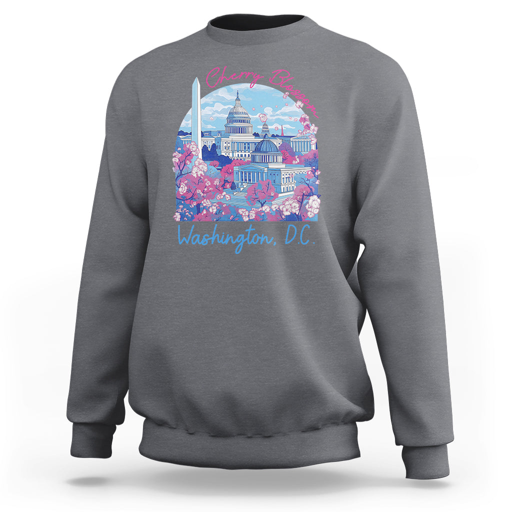 Gray crewneck sweatshirt with colorful cherry blossom city graphic on chest