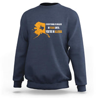 Navy crewneck sweatshirt with yellow map and text graphic on chest