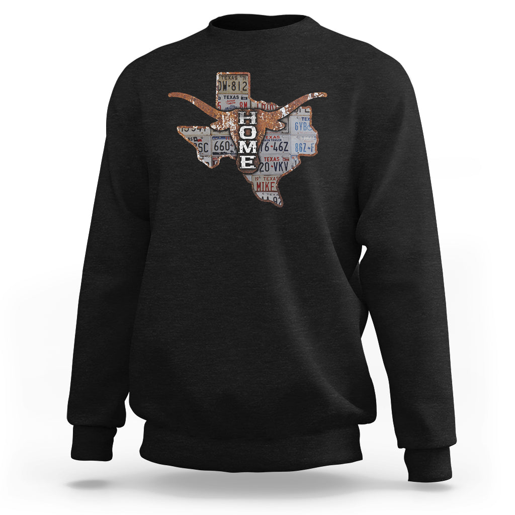 Black crewneck sweatshirt with Texas map graphic and longhorn design.