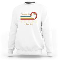 White crewneck sweatshirt with “Somebody Loves Me” Texas graphic on the chest