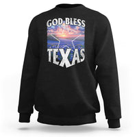Black crewneck sweatshirt with 'GOD BLESS TEXAS' graphic print on front