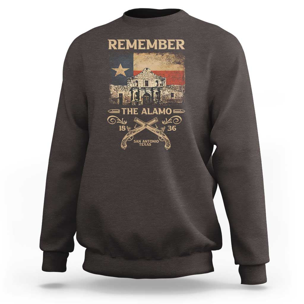 Charcoal crewneck sweatshirt with 'Remember' Alamo graphic and star-and-swords print.
