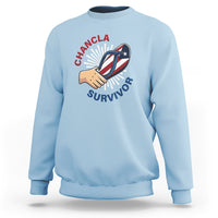 Light blue pullover sweatshirt with front graphic logo and ribbed crew neckline