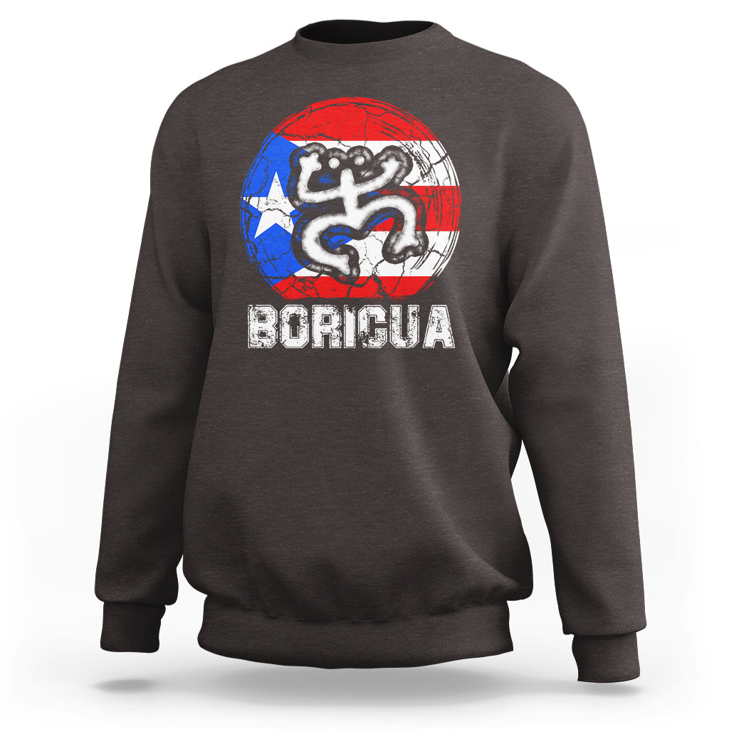 Dark brown crewneck sweatshirt with coqui graphic and BORICUA text on chest