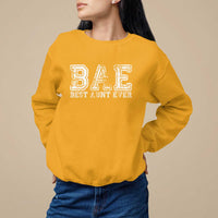 Gold sweatshirt with 'BAE' and 'Best Aunt Ever' front print