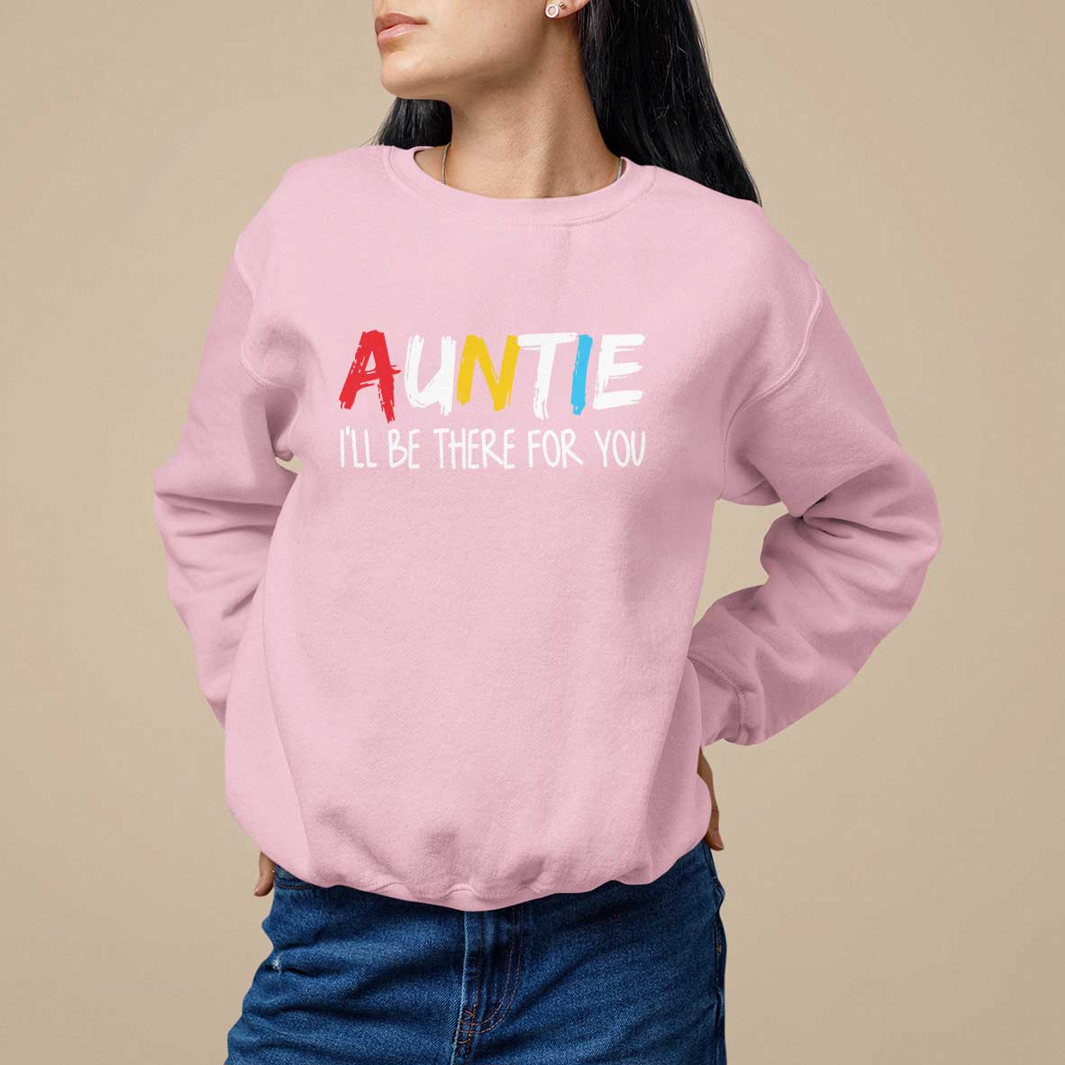 Light pink crewneck sweatshirt with red "AUNTIE" and "I'll be there for you" print